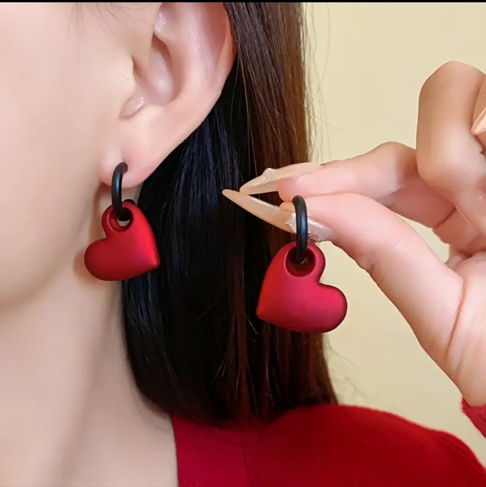 Red heart dangle earrings